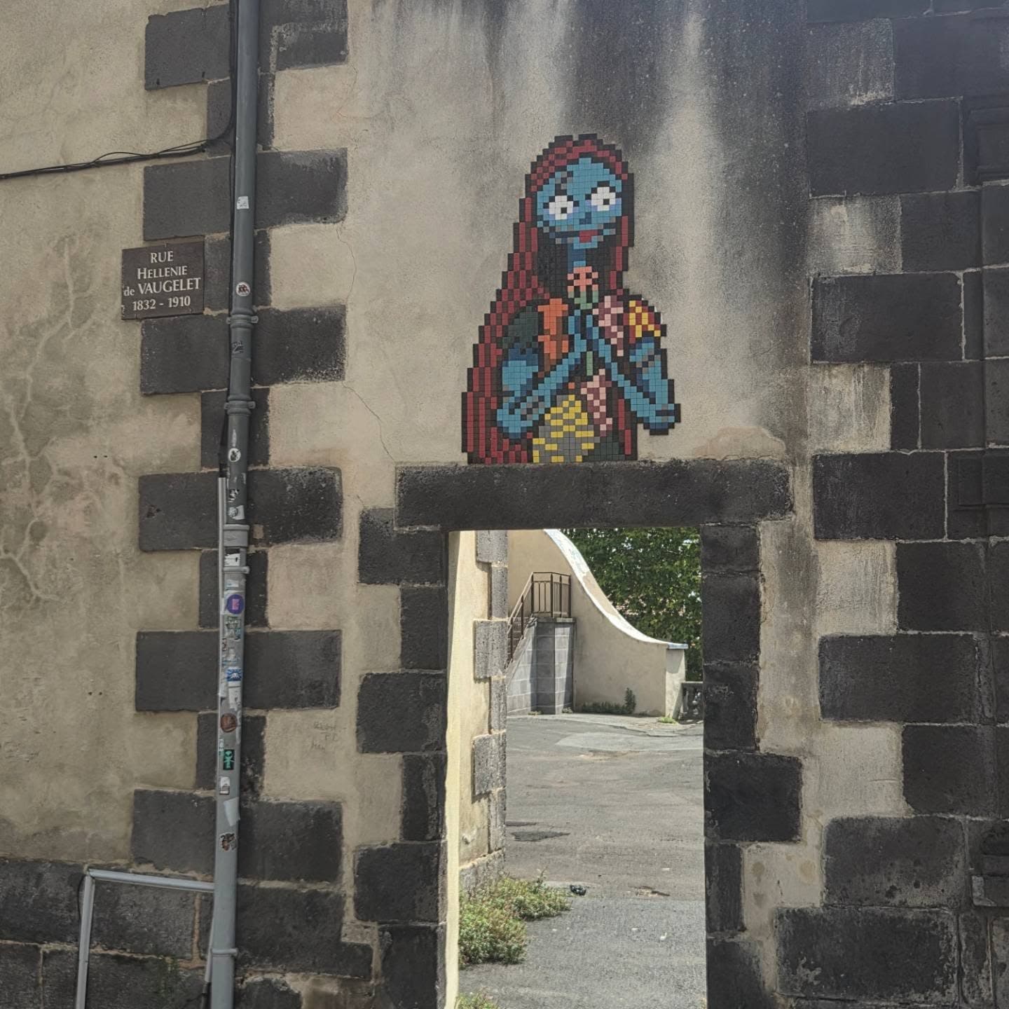 Photo by Invades your space on July 27, 2026. May be pop art of brick wall and text.